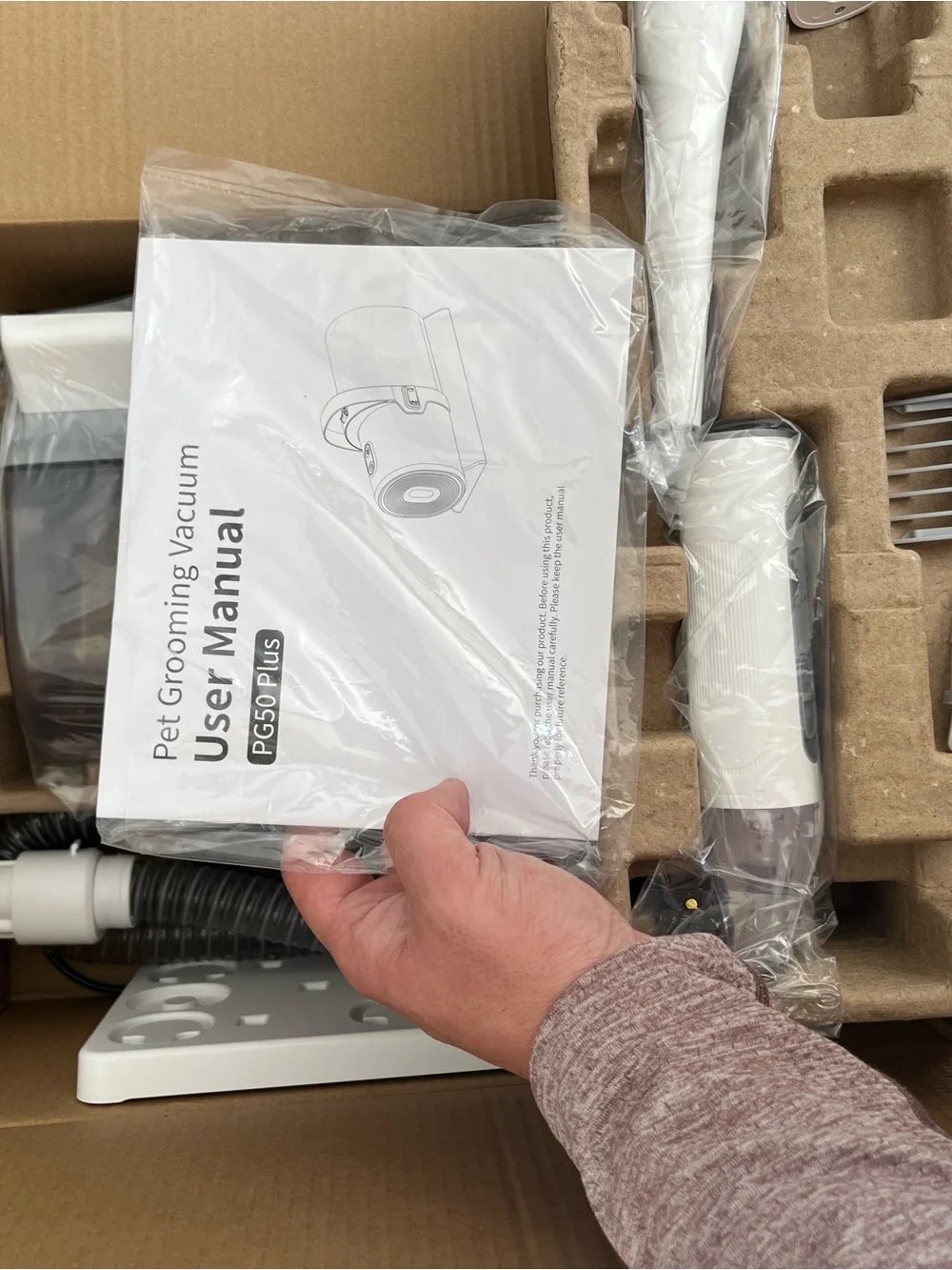 White and Gray Compact Appliance with Hose